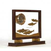 Pendulette Hermès Paris, attribuée à Jean Pascaud, vers 1940 Bois de palissandre, laiton doré, verre gravé