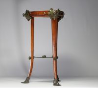 Louis MAJORELLE (1859-1926) Beautiful mahogany pedestal table decorated with water lilies in green patinated bronze.