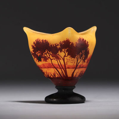 DAUM Nancy - Three-lobed vase on pedestal in orange multi-layered glass with landscape design, signed.