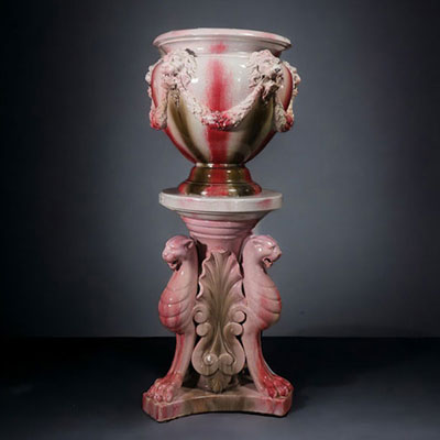 An imposing barbotine pot cover on a column decorated with griffins and lions' heads, circa 1900.