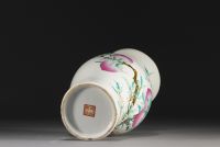 China - Porcelain vase with nine peaches design, famille rose, Qing period.