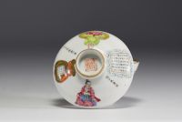 China - Covered bowl and saucer in famille rose 