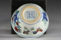 China - Set of three porcelain bowls decorated with roosters, hens and chicks in Ducaï enamels.