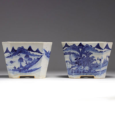 China - Pair of blue-white porcelain planters with landscape decoration, Qing period.