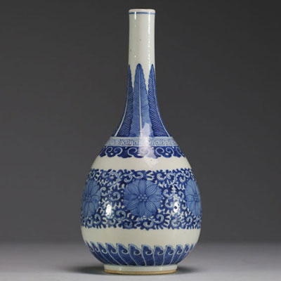 China - A white-blue porcelain vase with floral decoration, Yongzheng mark, 19th century.