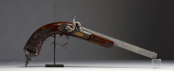 Magnificent ‘Anton Vinzenz Lebeda’ Prague pistol, carved stock, damascened octagonal barrel, gold inlay on locks and hammer, signed.