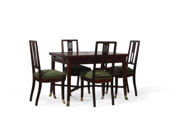 Set of four Art Nouveau mahogany chairs and table, Austria, circa 1910.