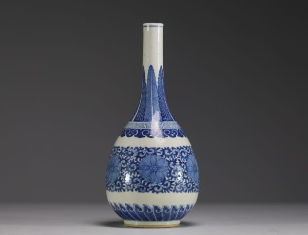China - A white-blue porcelain vase with floral decoration, Yongzheng mark, 19th century.