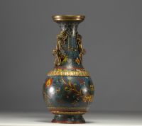 China - A Qing-period cloisonné vase with dragon decoration and bronze handles.