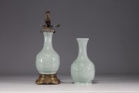 China - A celadon porcelain oil lamp and shaft decorated with flowers and bamboos, 18th-19th century.