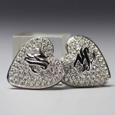 Karl LAGERFELD - Pair of heart earrings, silver-plated metal and rhinestones.