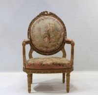 Important set of carved and gilded wood salon furniture, fine Aubusson tapestry including a sofa and a suite of four bergère armchairs, 19th century.