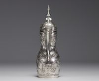 An ottoman silver embossed coffee pot decorated with flowers, scrolls and acanthus leaves. Orient, 19th century.