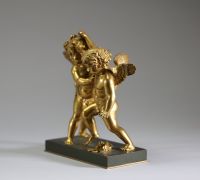 Couple d'Amours se disputant en bronze doré sur socle en marbre noir, époque Empire - Charles X, fin XVIIIème début XIXème.