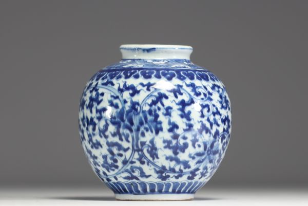 China - A white-blue porcelain vase with floral decoration, 19th-20th century.