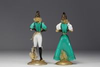 Murano - Pair of blown glass candlesticks with gold flakes.