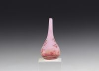 DAUM Nancy - Vase soliflore miniature à décor d'un cerisier du Japon sur fond rose.