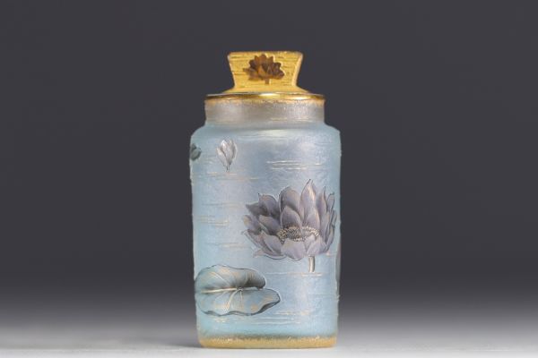 DAUM Nancy - Small perfume bottle in acid-etched frosted glass, enamelled decoration of water lilies, signed.