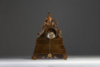 Pendule en bronze doré et patiné figurant un berger et son mouton, XIXème.