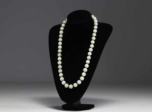 China - Jade pearl and black coral necklace, silver clasp.
