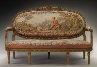 Important set of carved and gilded wood salon furniture, fine Aubusson tapestry including a sofa and a suite of four bergère armchairs, 19th century.