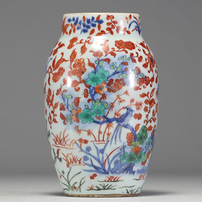 China - A polychrome porcelain vase decorated with bamboos, flowers and birds, 17th century.