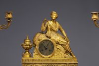 Pendule et candélabres en bronze doré à sujet Orientaliste, début XIXe siècle.