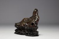 China - Li Bai Qing, bronze statue on openwork wooden base, Qing period.