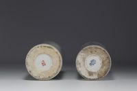China - Set consisting of a pair of porcelain brush holders and a covered pot, 20th century.