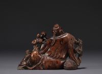 China - Dignitary with monkey in hard stone, representing three characters, 18th-19th century.