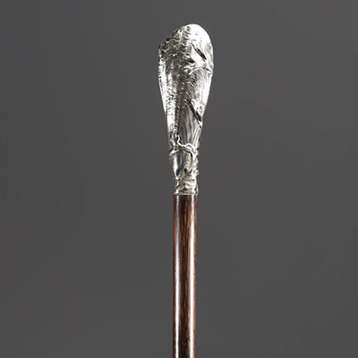 Art Nouveau silver cane with a mould and seaweed motif.