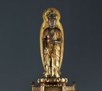 Japan - Carved lacquered and gilded wood Buddha on an openwork base, 19th century.