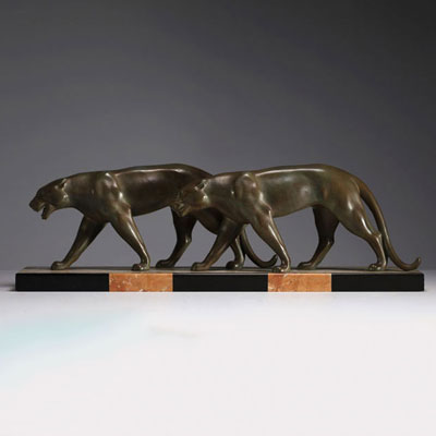 ‘Couple of panthers’ Art Deco sculpture in patinated regula on marble base, circa 1930.