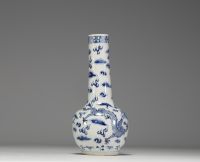 China - White-blue porcelain vase decorated with dragons, blue mark under the piece.