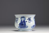 China - White and blue porcelain brush with sage decoration.