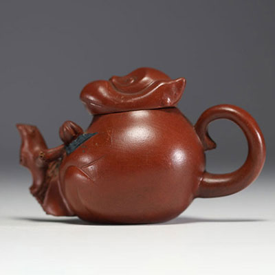 China - Yixing clay teapot in the shape of a monkey, debossed mark on the underside.