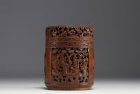 China - Covered carved bamboo pot decorated with figures and a phoenix.
