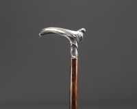 Cane with an Art Nouveau motif, shaft in fine wood, solid silver knob decorated with a woman in bloom.