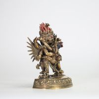 TIBET, XIXe SIÈCLE Figure de Hayagrīva en bronze doré et éléments polychromes.