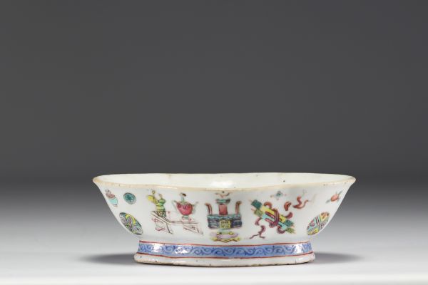 China - Famille rose polychrome porcelain bowl decorated with furniture, circa 1920.