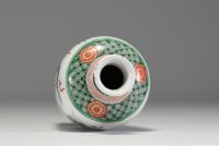 China - A 19th century green family polychrome porcelain vase decorated with a dragon.