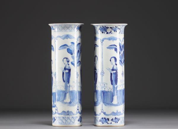 China - Pair of blue-white porcelain vases decorated with ladies and bats, Kanjxi mark, 19th century.