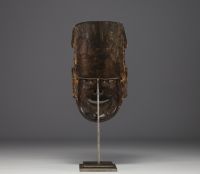 China - Nuo theatrical ritual exorcism mask in polychrome wood, 18th century.