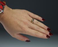 Ring in 18k white and yellow gold set with a brilliant-cut diamond weighing 3.5g.