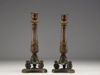 Paire de bougeoirs en bronze à double patine d'époque Charles X.