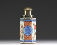 China - Polychrome porcelain tea caddy decorated with a village, silver stopper, 18th century.