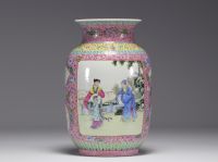 China - A Republic-period famille rose porcelain vase decorated with cartouche figures, flowers and insects (Apocryphal Qionlang mark)