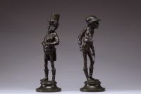 Émile GUILLEMIN (1841-1907) Suite de deux personnages grotesques en bronze patiné dans le style Daumier, signés sur la terrasse.