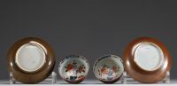 China - Set of two porcelain bowls and plates with interior floral decoration and nasturtium, 18th century.