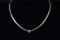 Necklace in 18k gold and brilliant-cut diamonds weighing 40g.